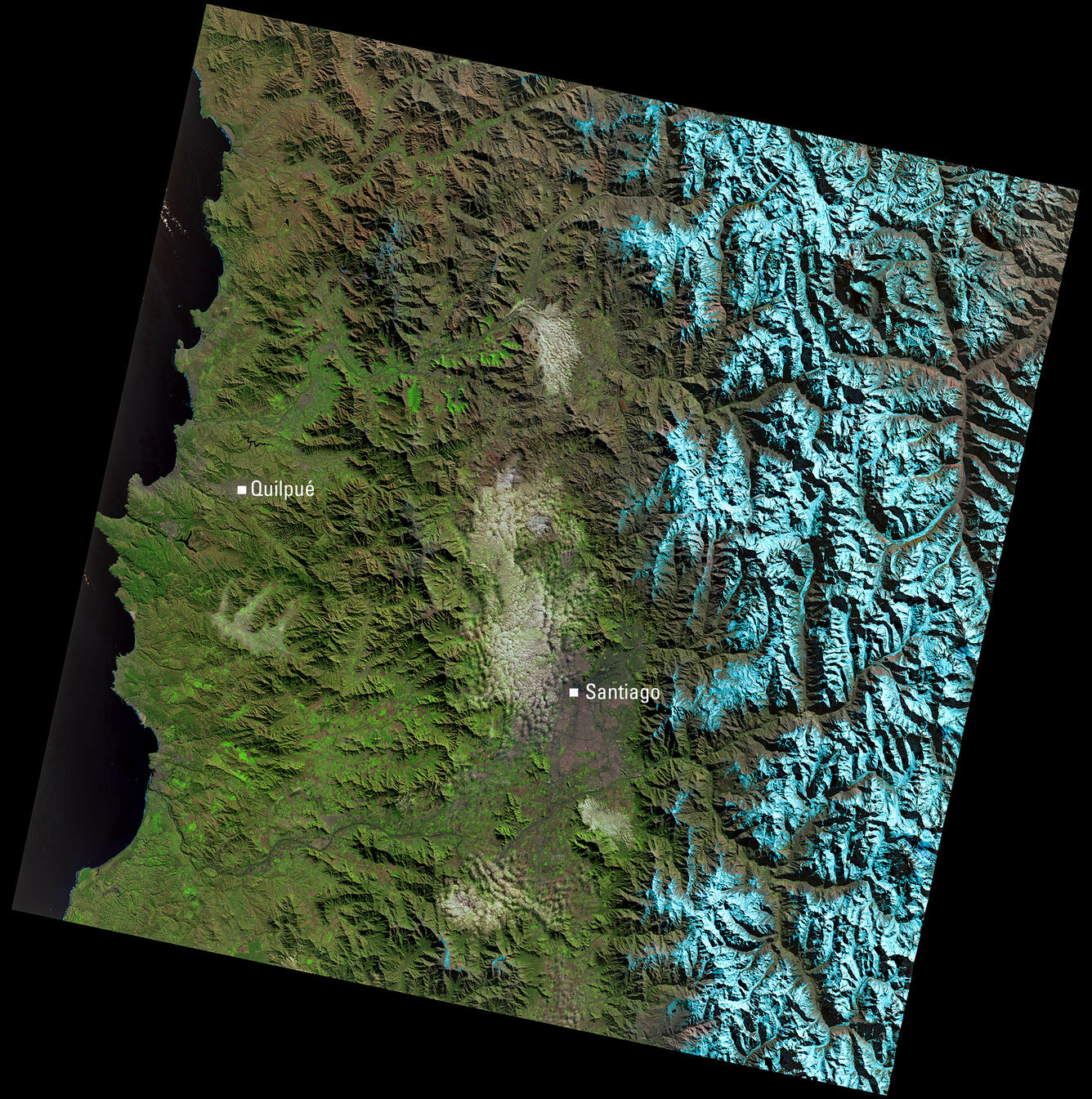 Satellite image of central Chile showing Santiago, Quilpué, and the snow-covered Andes Mountains.