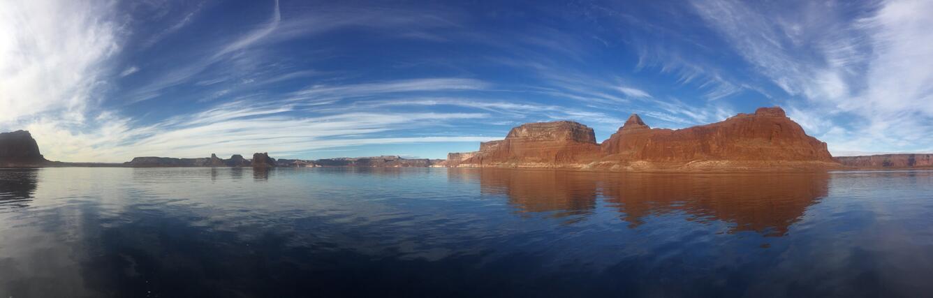 Panorama of Lake Powell taken from the water with rocks in the distance