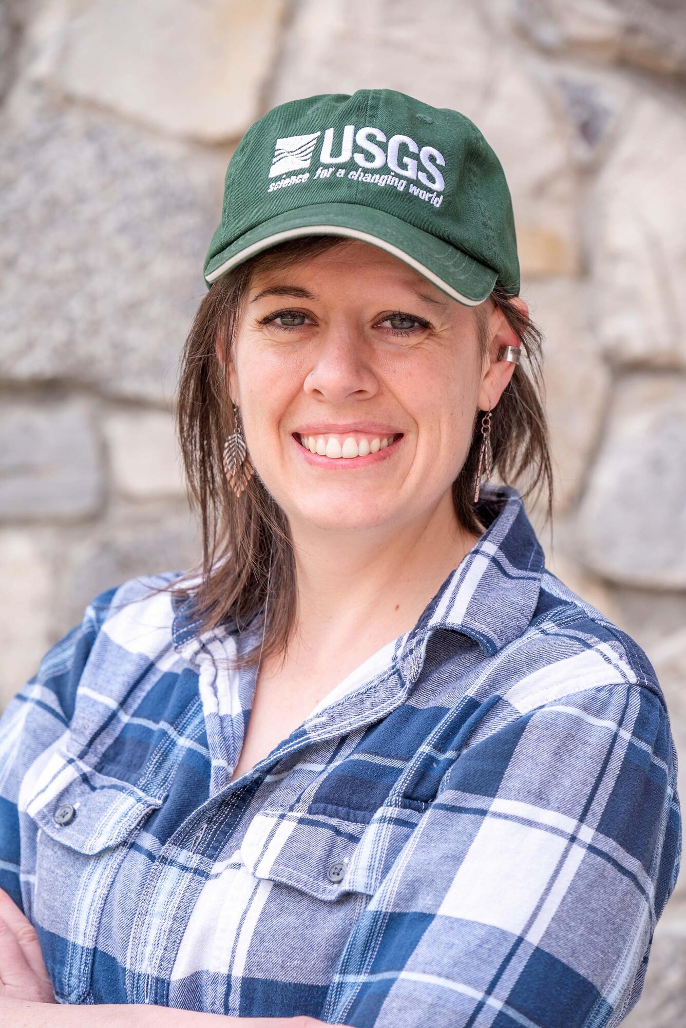 Headshot of Karli Rogers wearing a USGS hat