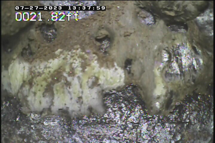 Calcium deposit, looking from sideview, in groundwater well 29AA03