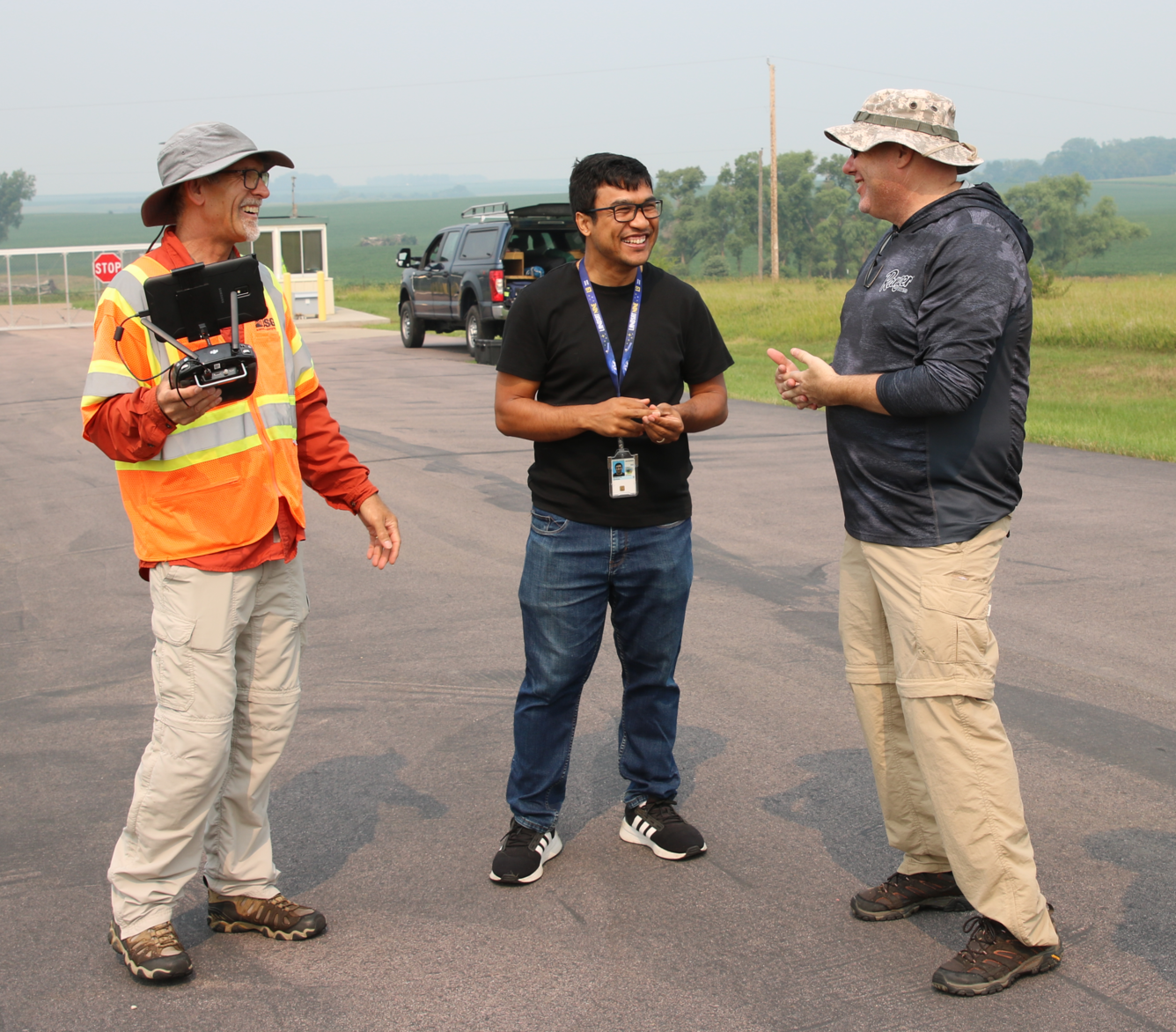 Three man chatting.