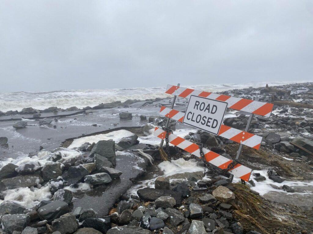 Photo of a road damaged by storm surge during Typhoon Merbok