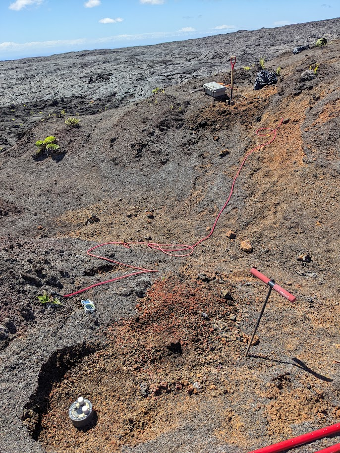 Color photograph of instrument being deployed in the ground.