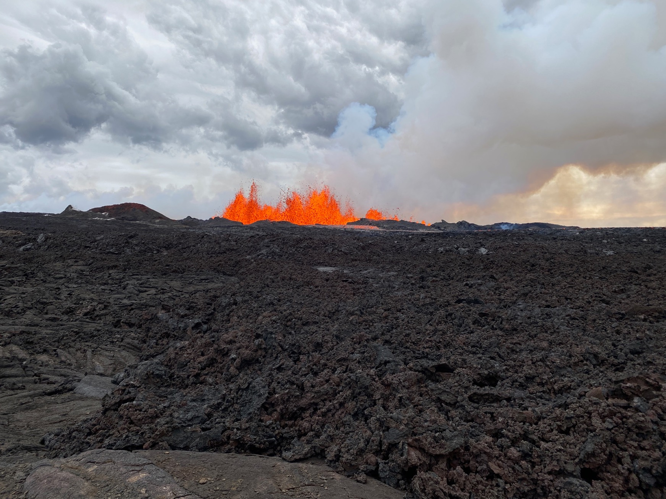Color photograph of volcanic fissure erupting