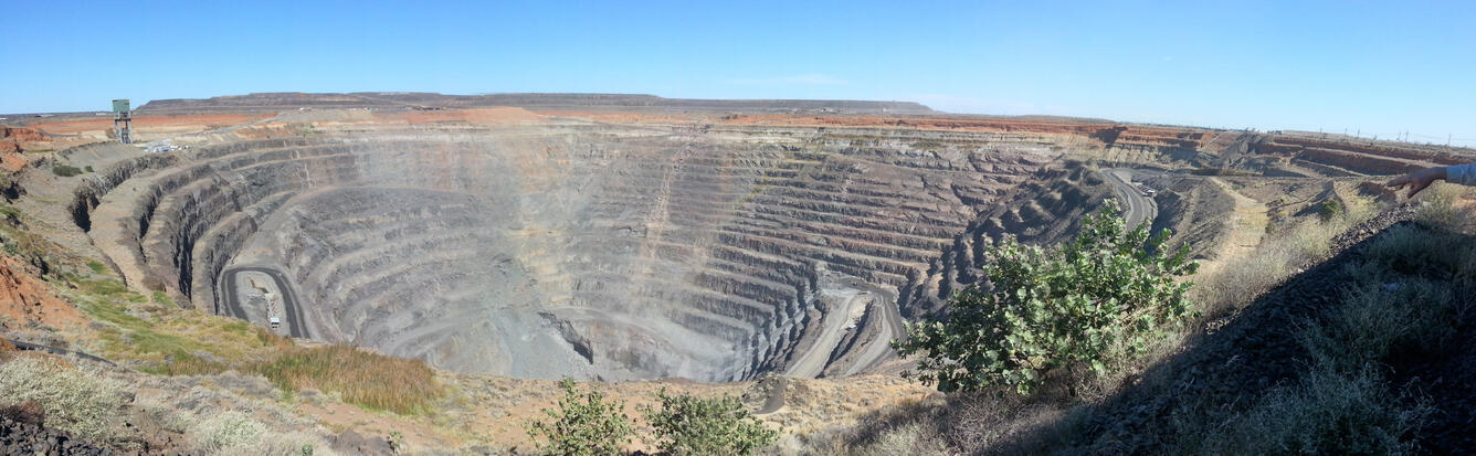 circles of dirt going up a hill