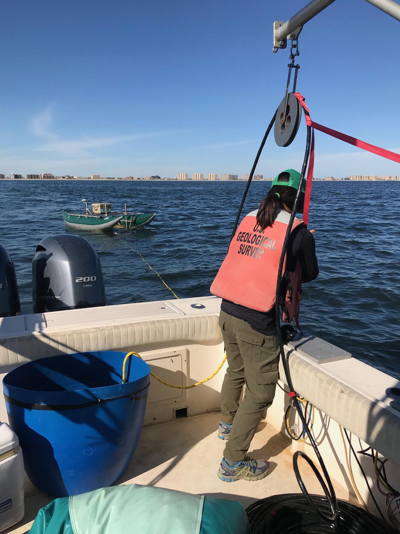 A scientist deploys a sound velocity cast during a geophysical survey