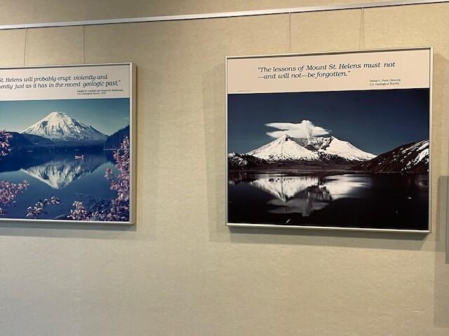 Framed, enlarged pictures of Mount St. Helens