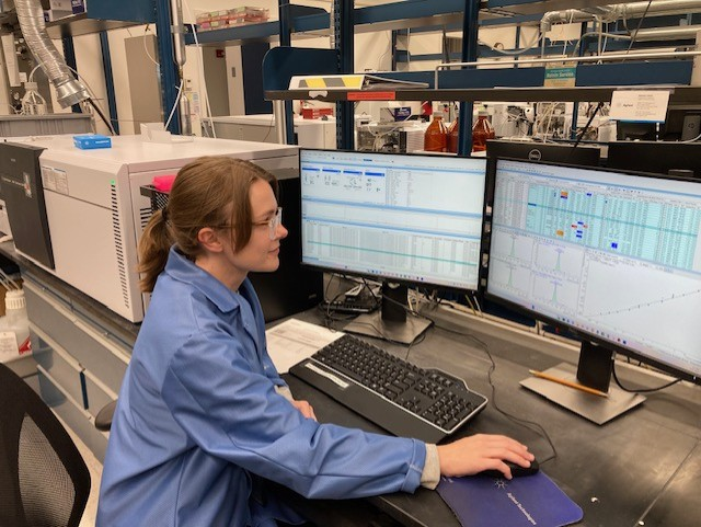 chemist reviewing water sample analysis results