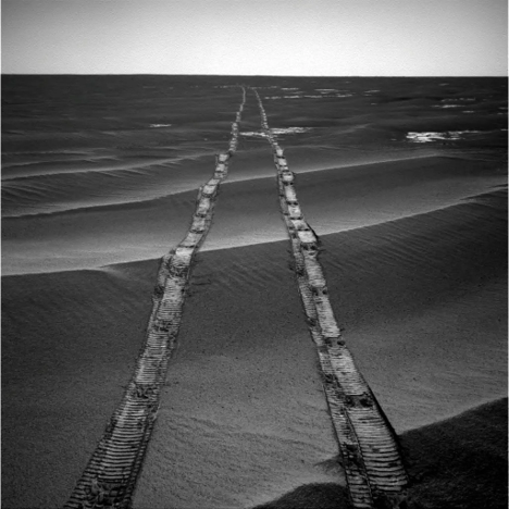 This is a photo of the Opportunity rover tracks on Mars.