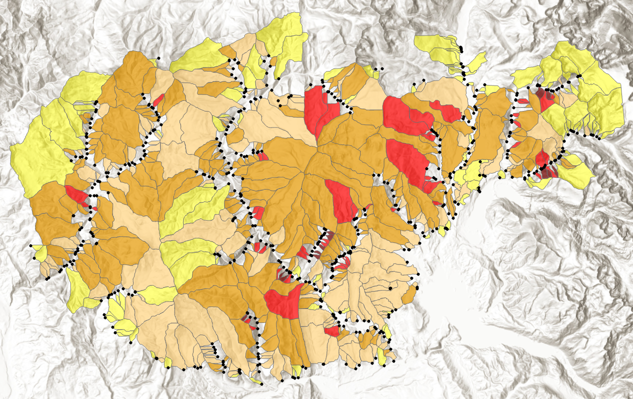 Multi color polygons overlying map of topography