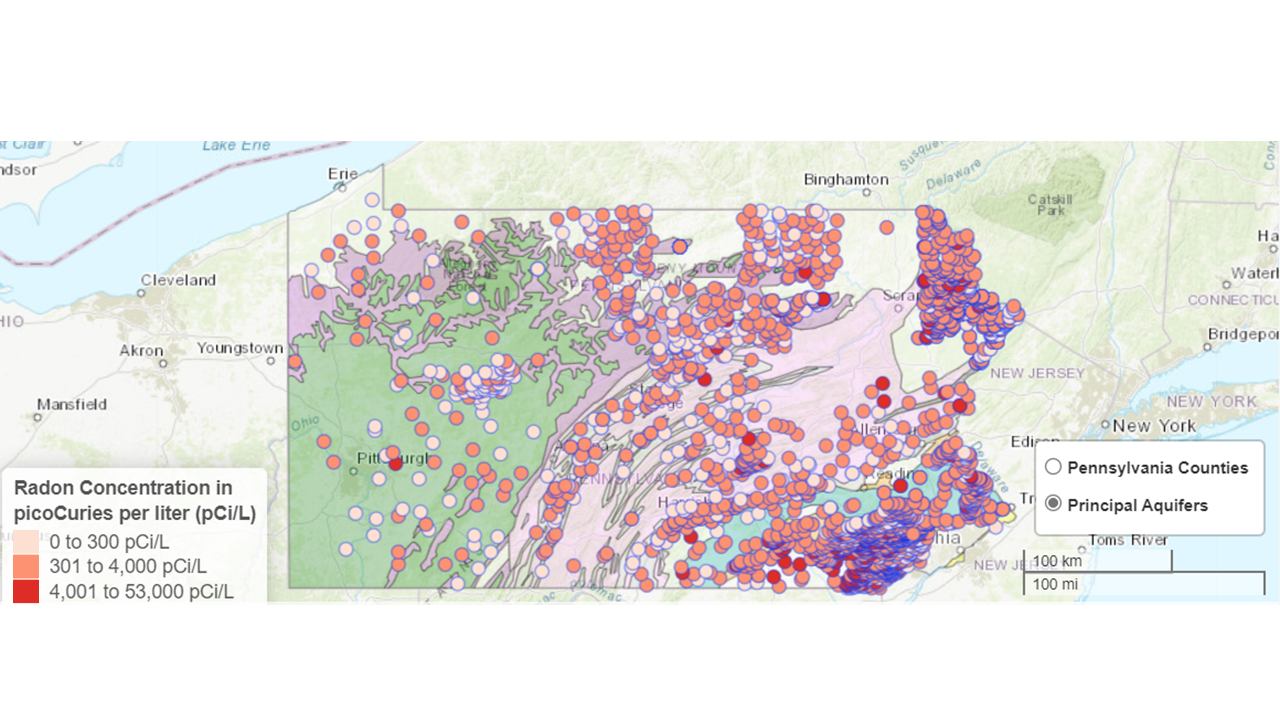 Map of Pennsylvania showing colored counties and colored dots with scale and color bar