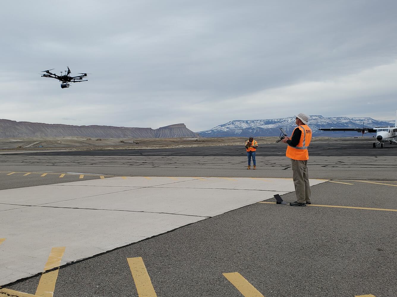 Drone being controlled by pilot at Grand Junction (Colorado) Airport