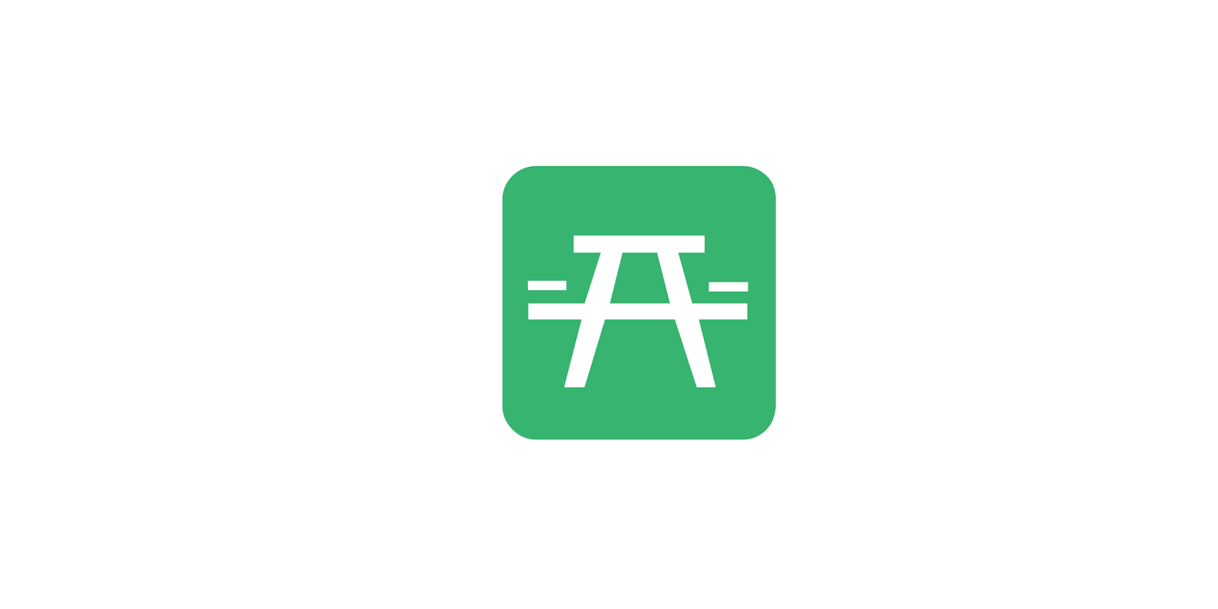 White picnic table inside a green square.