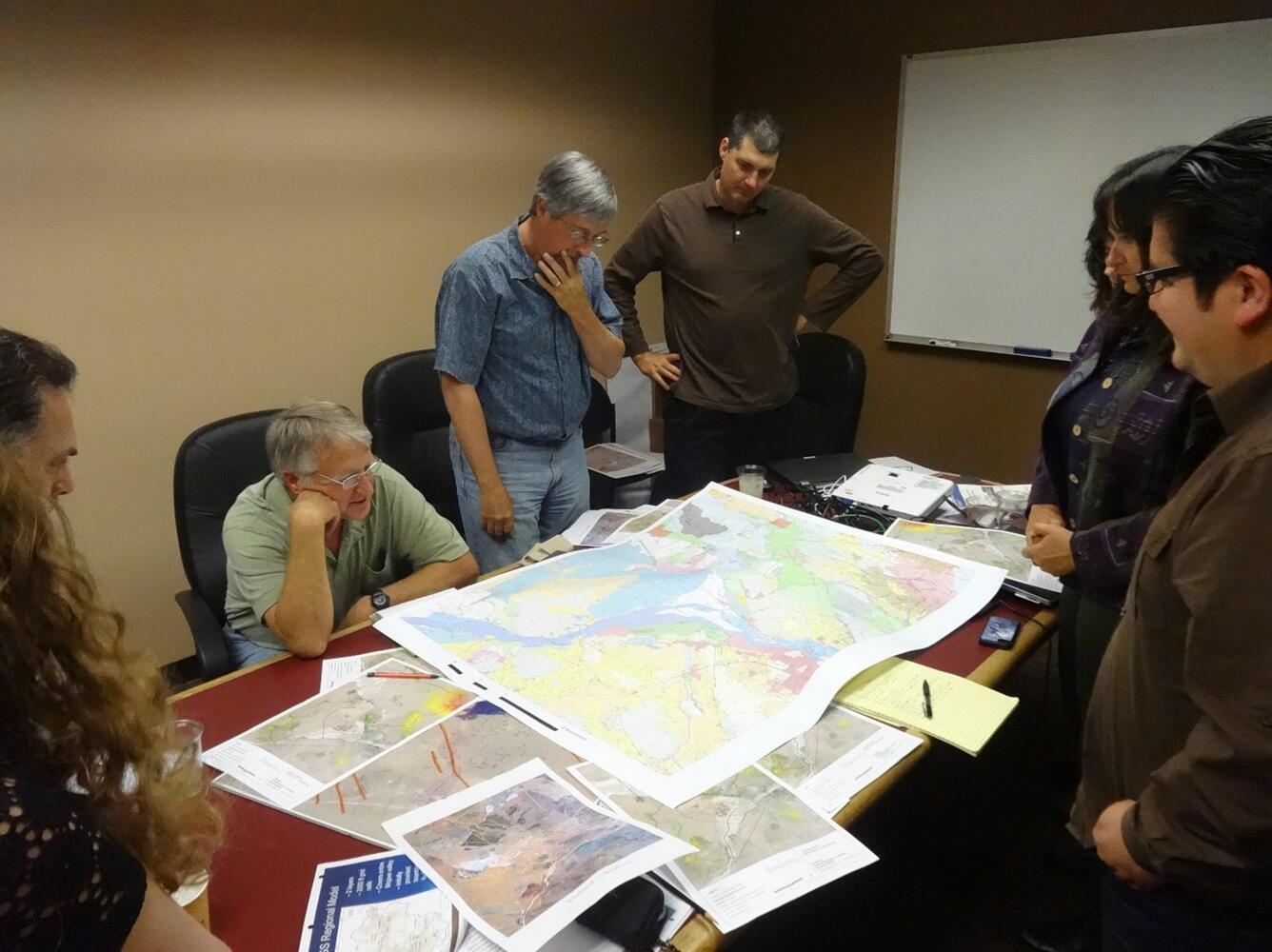 USGS scientist discussing differences in local geology within the groundwater aquifer with Hinkley residents.