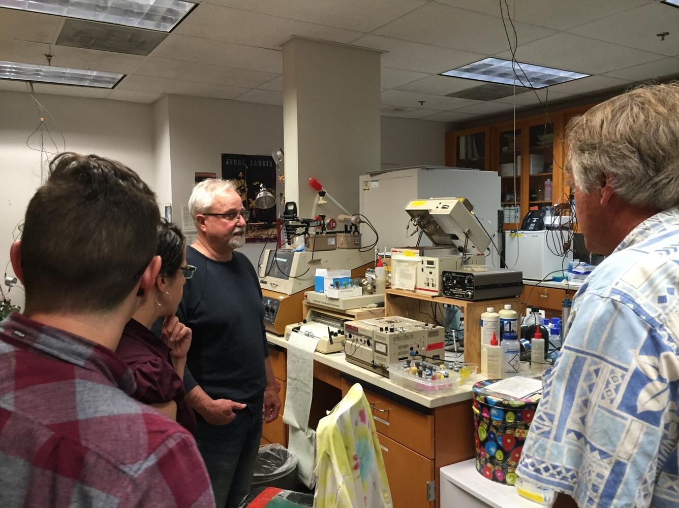 USGS researchers discussing Menlo Park lab analysis.