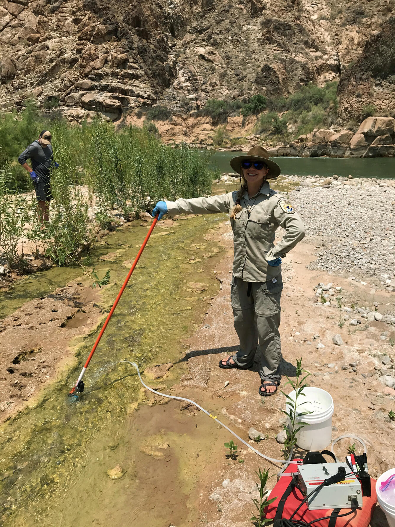 A USFWS colleague samples eDNA in Spencer Creek that flows into the Colorado River