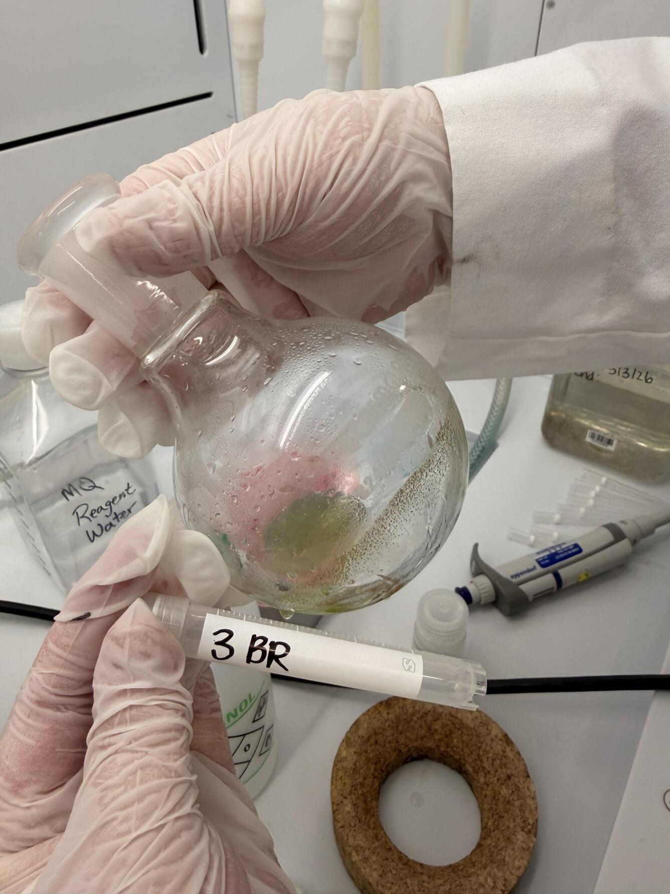 Closeup of crystals containing extracted cyanotoxins forming on the glassware during extraction process