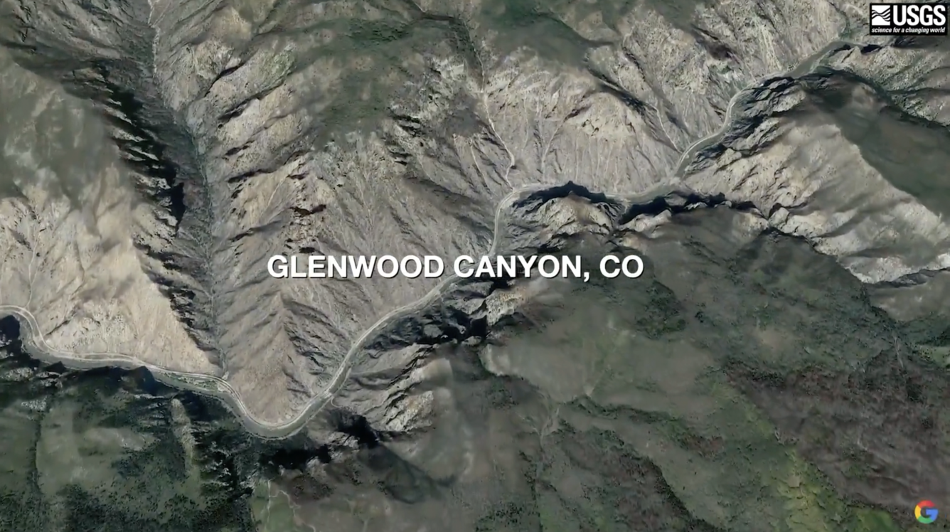 Satellite view of Glenwood Canyon, Colorado. The image shows mountains and a large canyon where a road is located. 