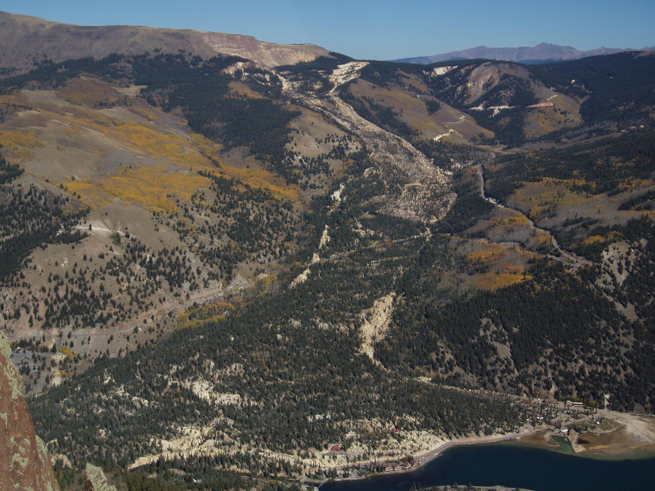 mountainside with trees covering an obvious old landslide