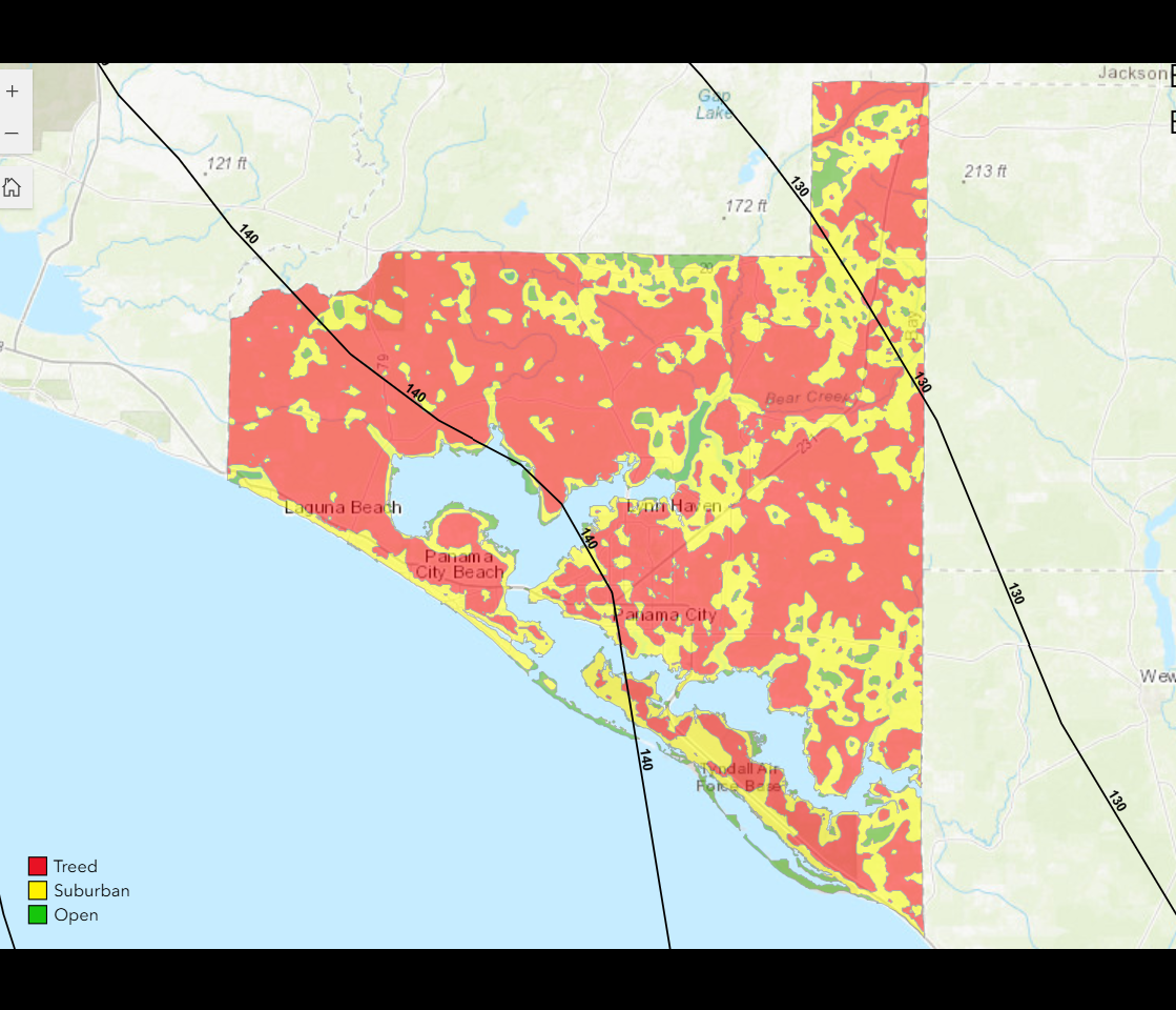 A coastline map with topography in the background and a portion of it in red, green and yellow