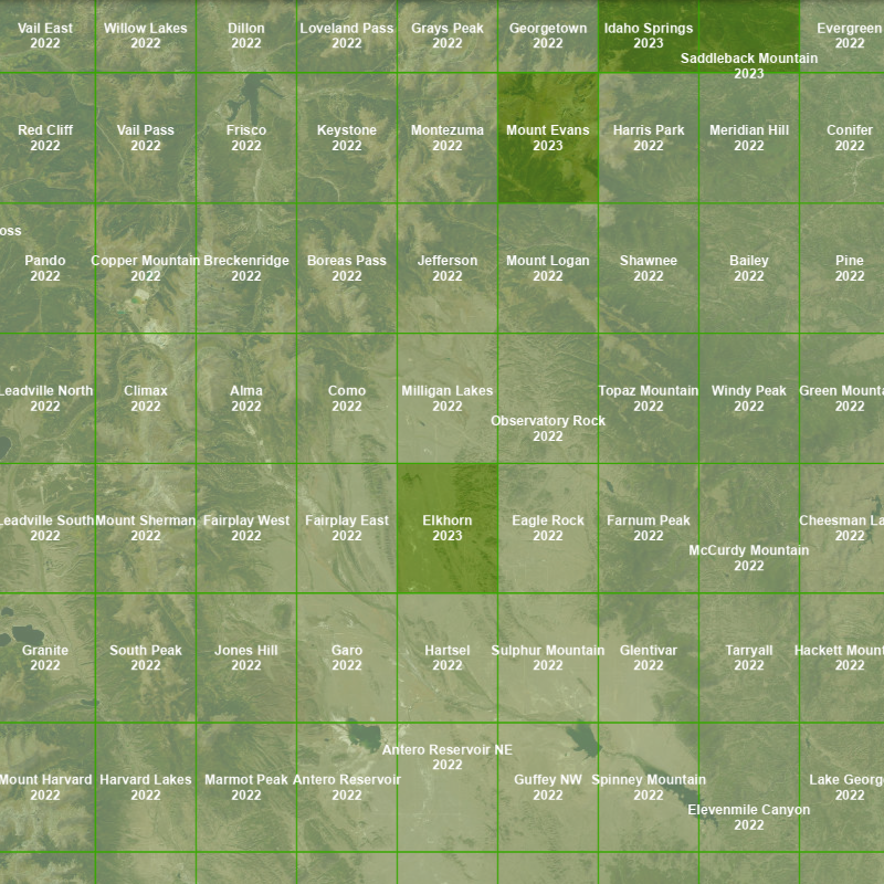 The Quad Index grid overlay displays with names and publication years of maps