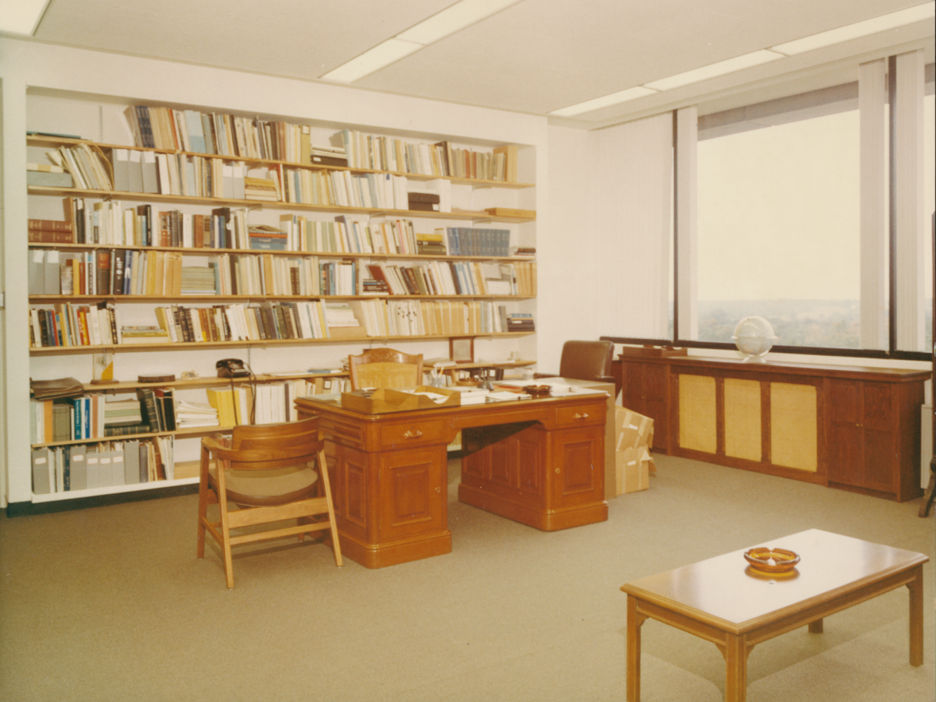 A sepia-toned photo of the Director's office.