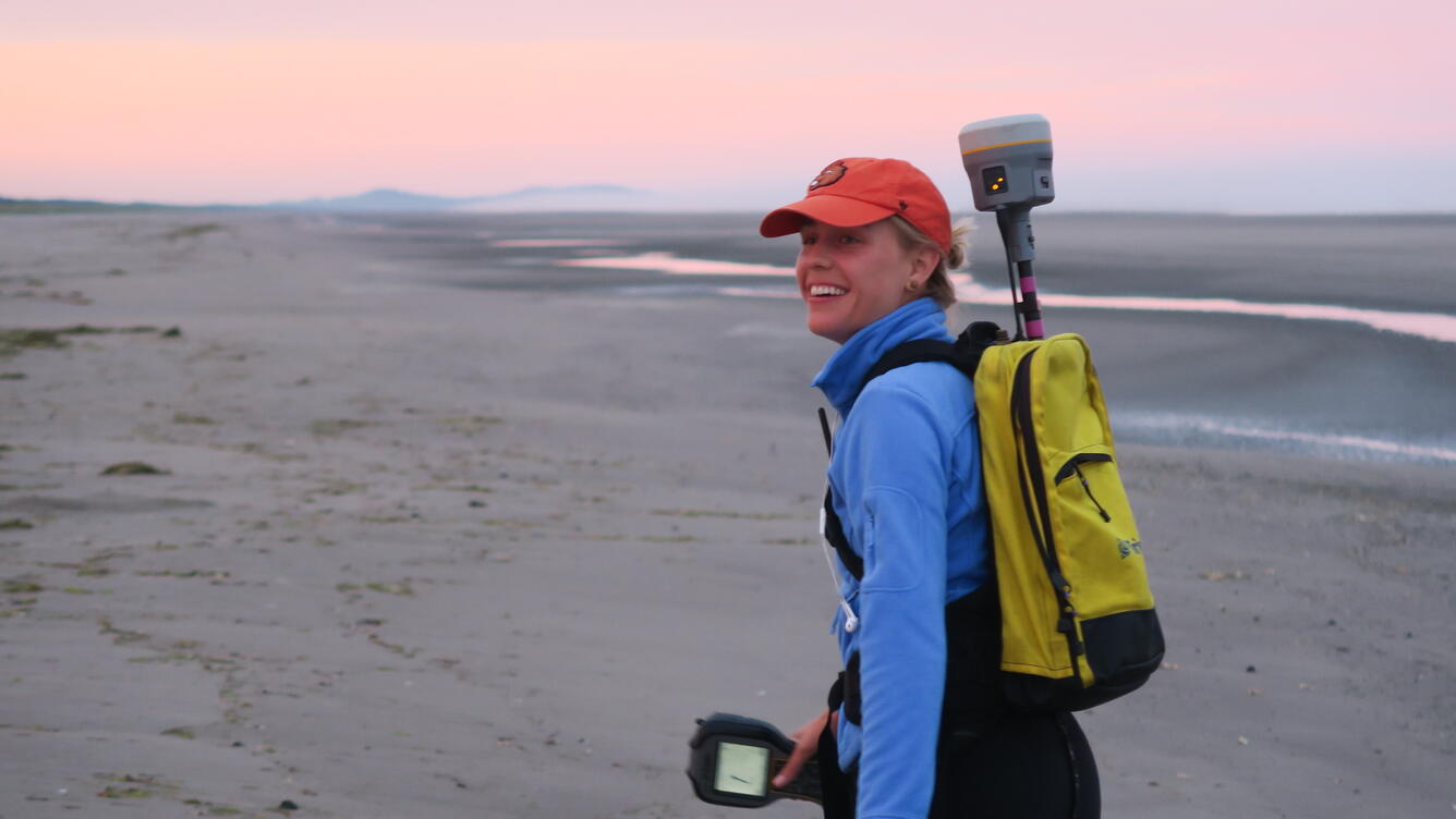 Paige Hovenga, former Graduate Research Assistant at Oregon State University, participating in a dawn topographic survey