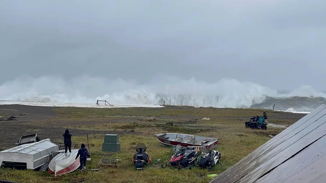 Residents in Nome, Alaska watch storm waves from Typhoon Merbok