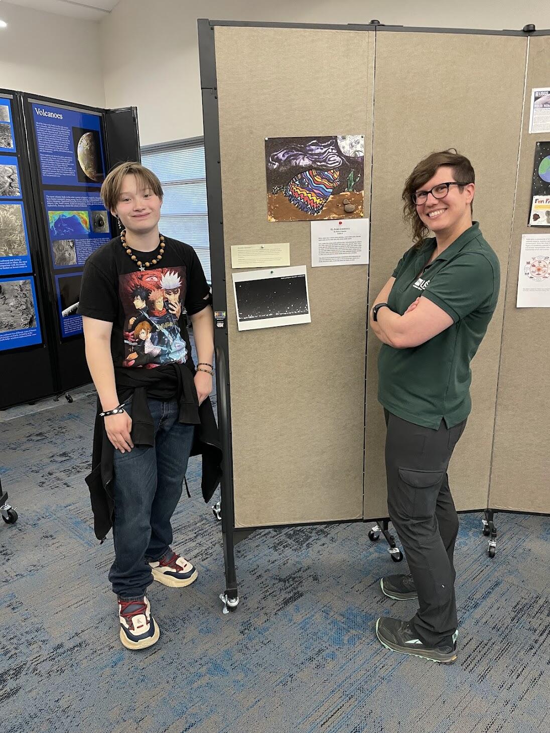 USGS scientist and FALA student at Art of inquiry show