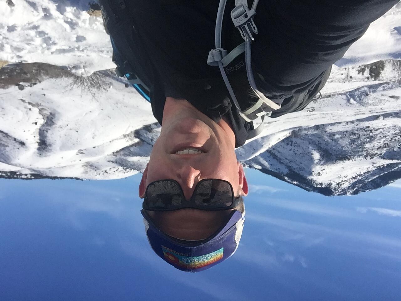 Nick Karl near snowy mountains