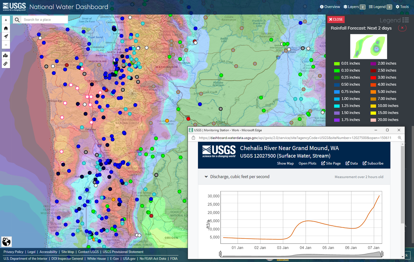 Screenshot of the National Water Dashboard mapping multiple gages in flood stage and more expected rainfall.