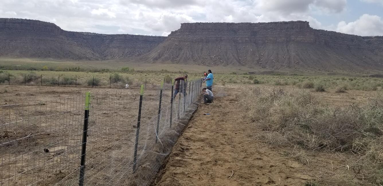 Group install an experiment with cliffs in the background