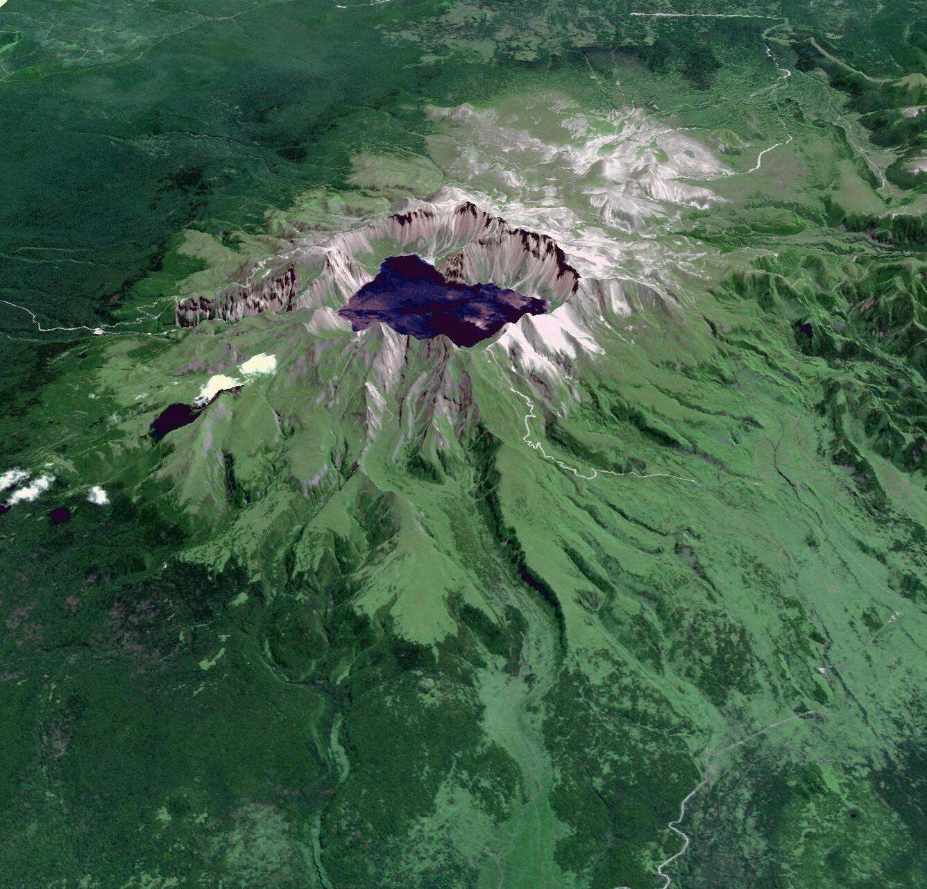 Satellite image of a volcano crater filled with a lake and green vegetation down much of the sides