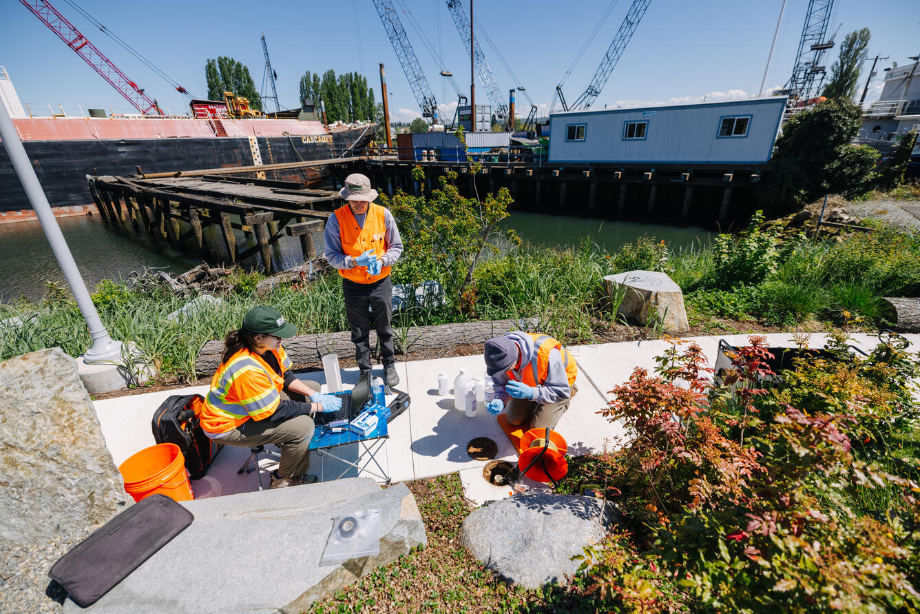 Scientists use equipment to measure well
