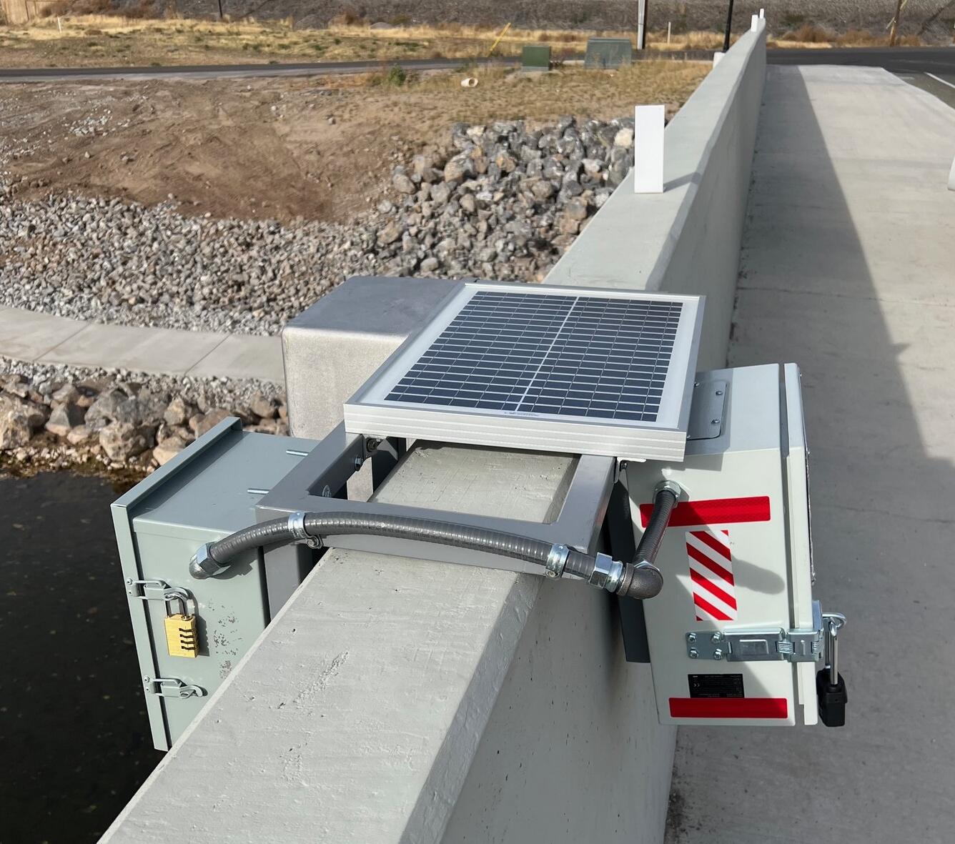 View of completed gage installed on bridge wall.
