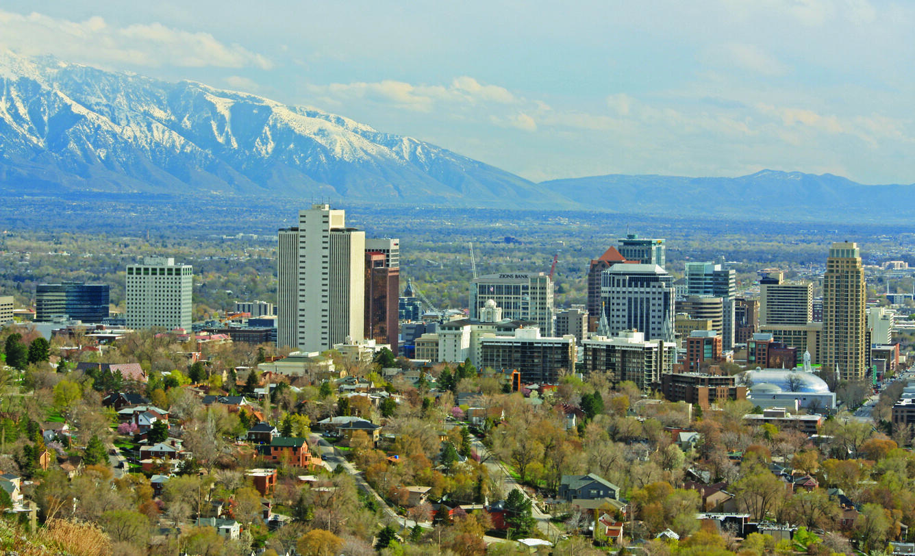 Salt Lake City Skyline showing buildings with mountains in background