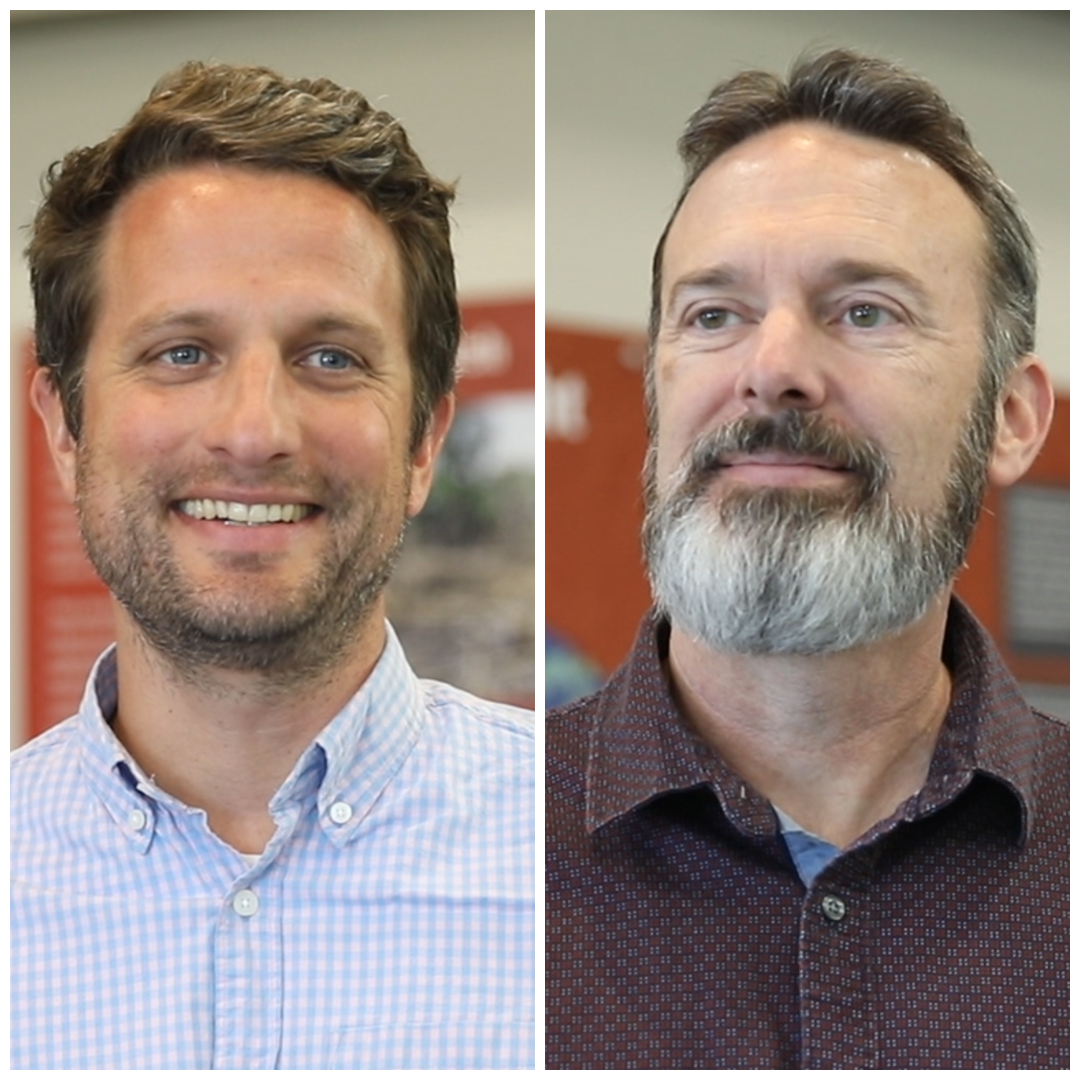 Mugshots of two men indoors