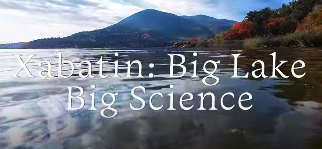 Screenshot of title screen for feature documentary “Xabatin Big Lake, Big Science.” 