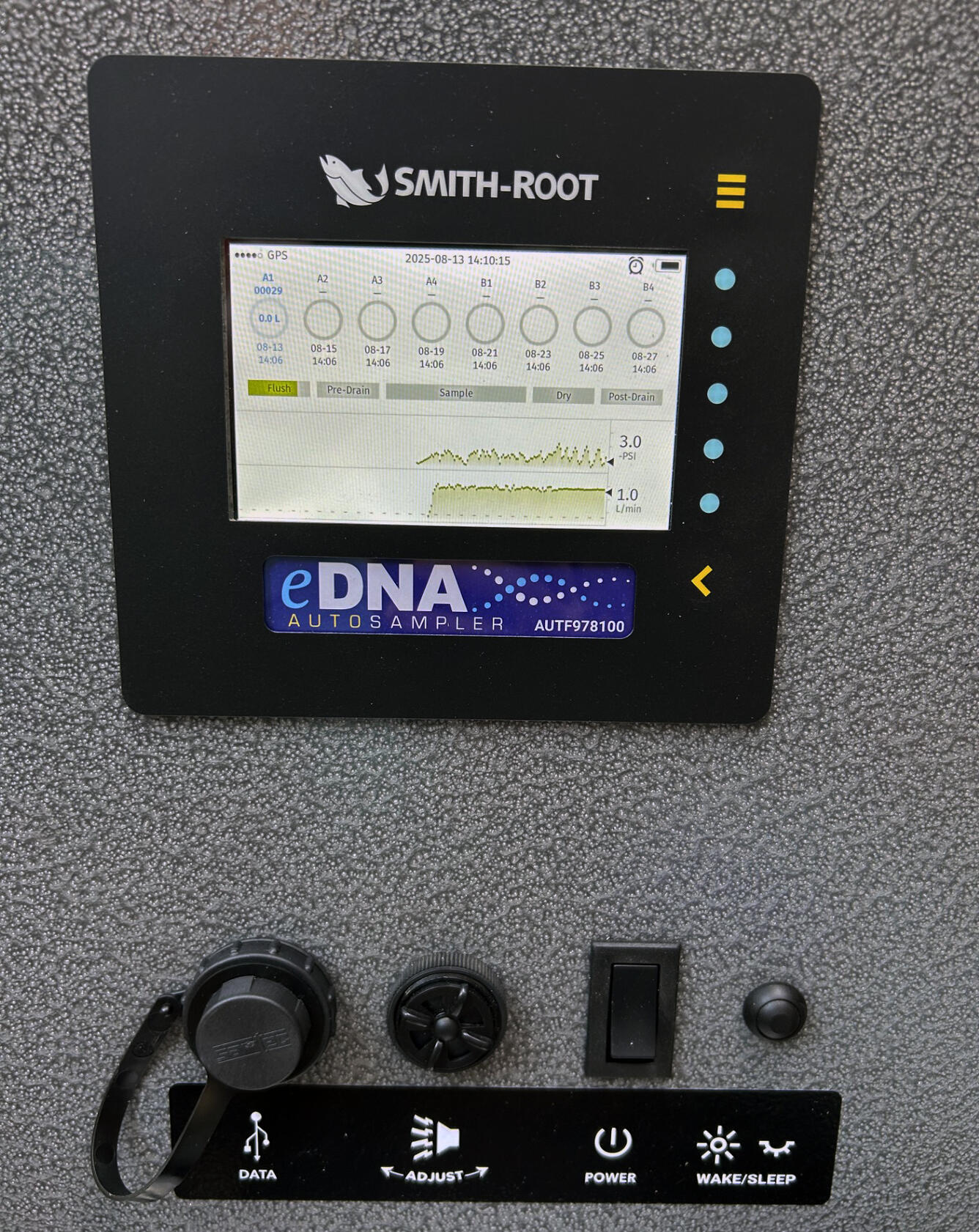 An eDNA autosampler console screen on the inside of the lid