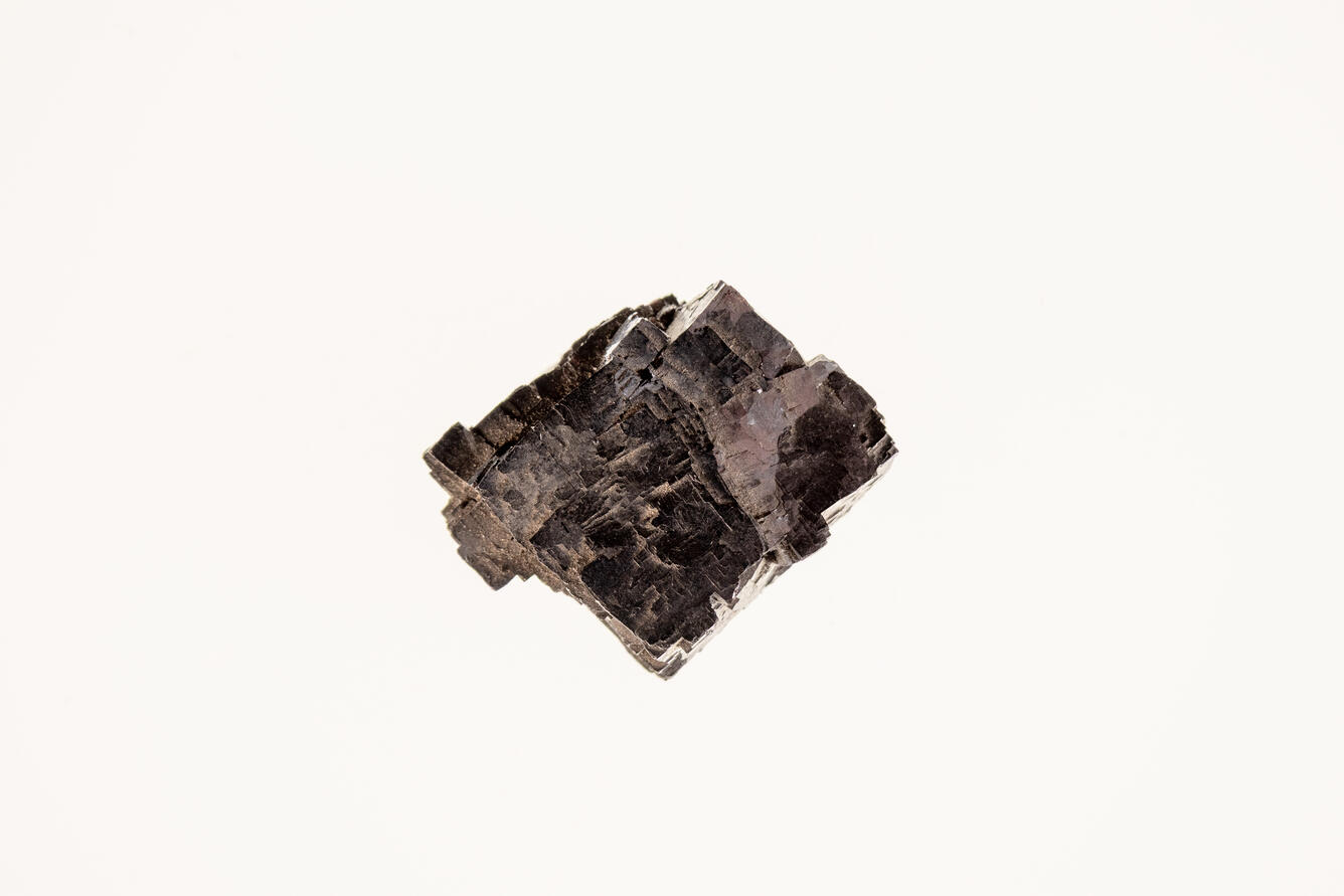 High-definition image of galena specimen showing crystal faces and silvery-gray color.
