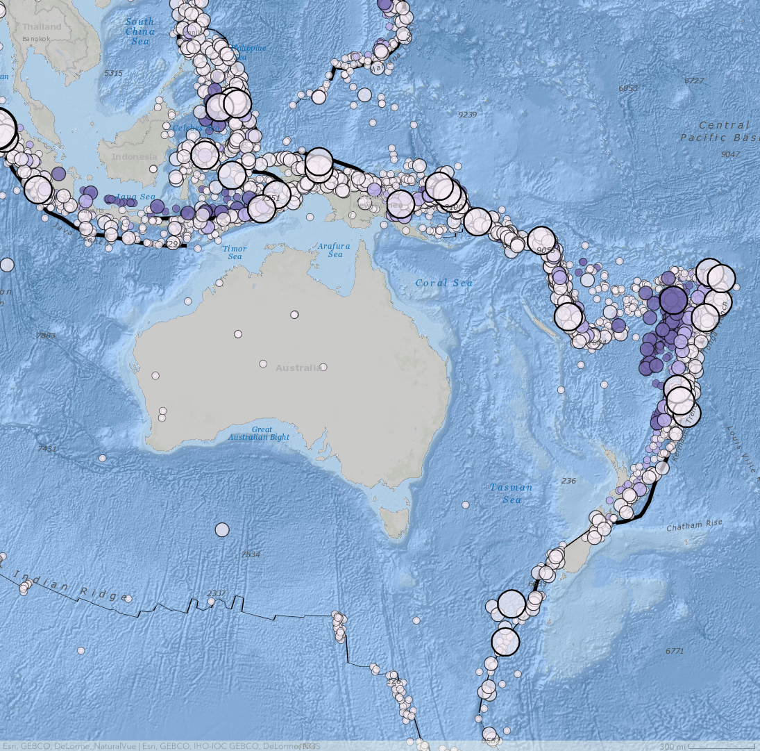 map showing Australia surrounded by ocean and circles of different colors for earthquakes