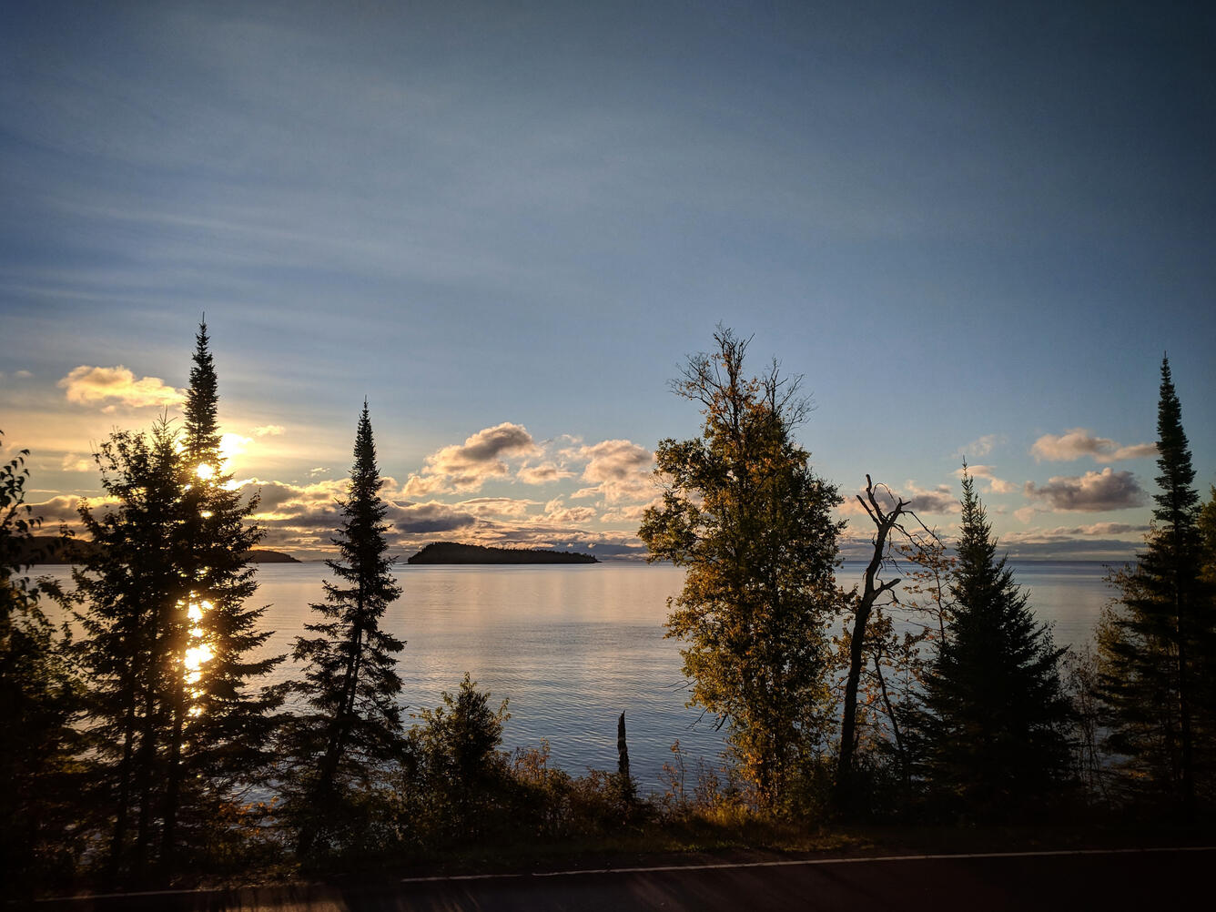 Looking at Lake Superior through the trees on the shore