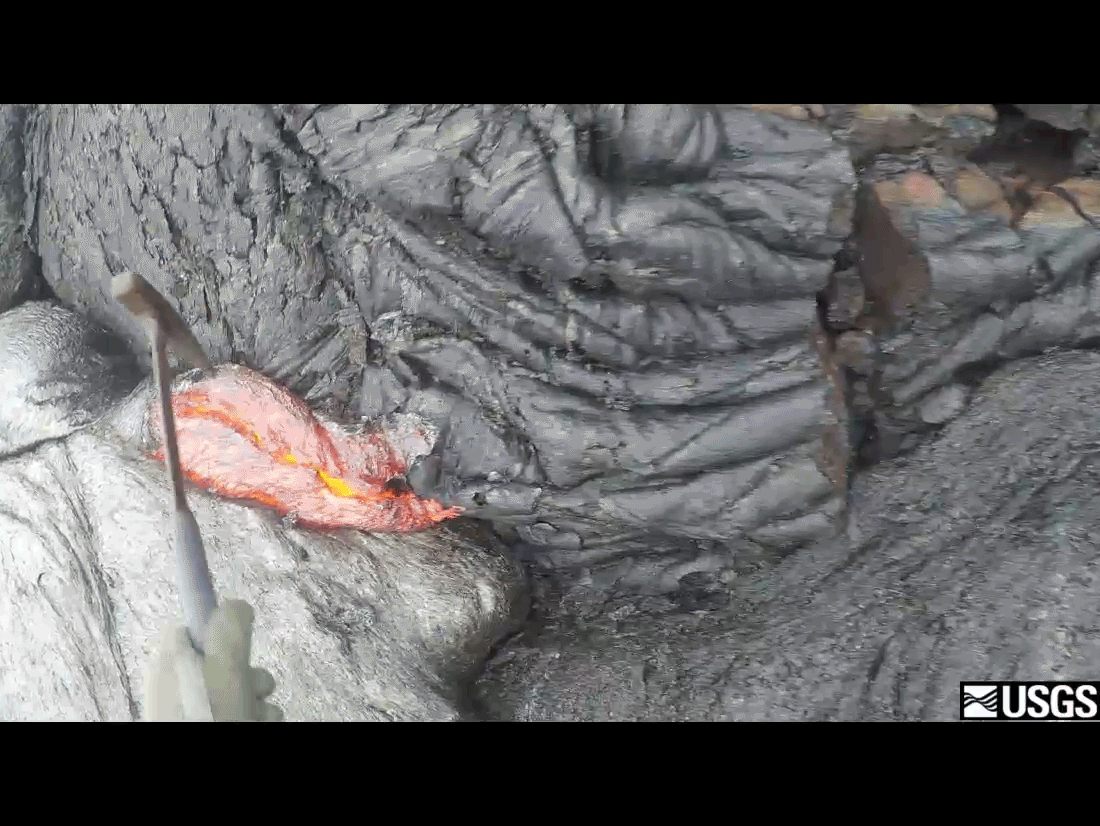 A repeating loop showing a hammer scooping lava from a flow and dropping it into a bucket.