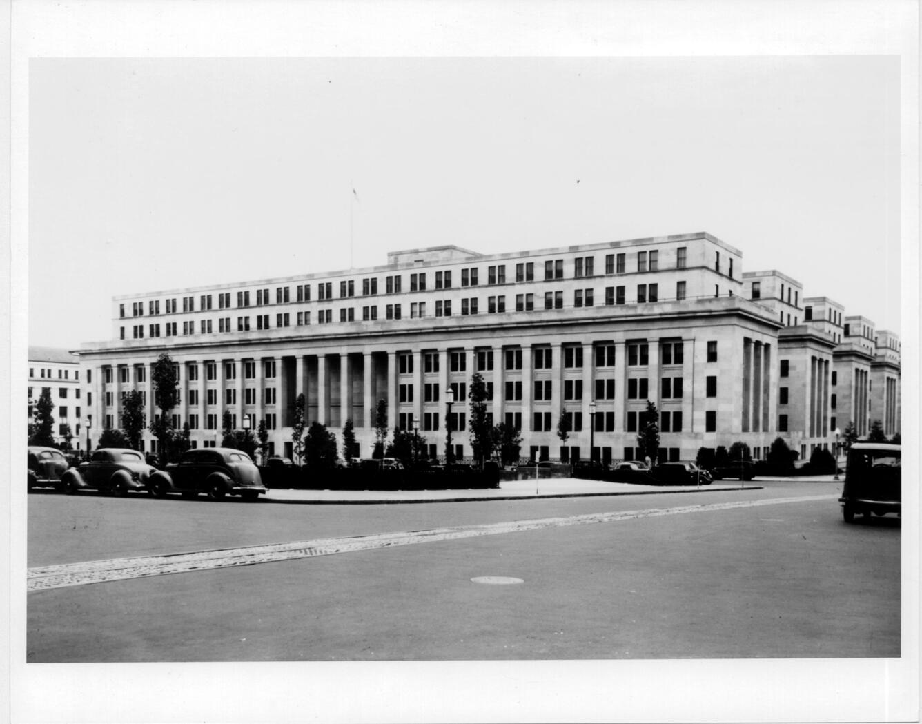 black and white photo of a white building