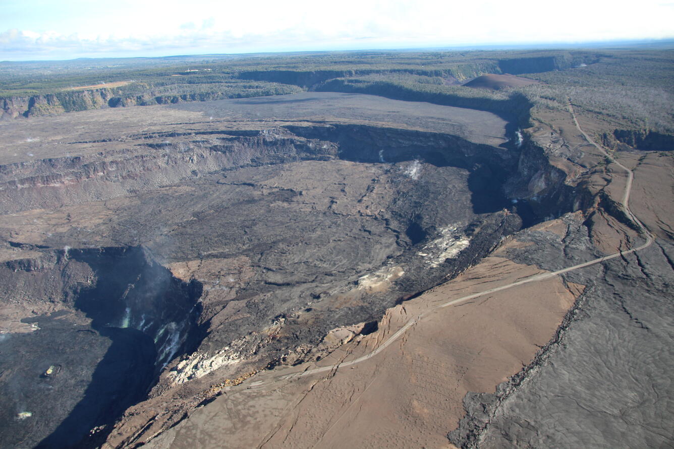 Color photo of Kilauea caldera showing the down-dropped blocks that formed during the 2018 caldera collapse