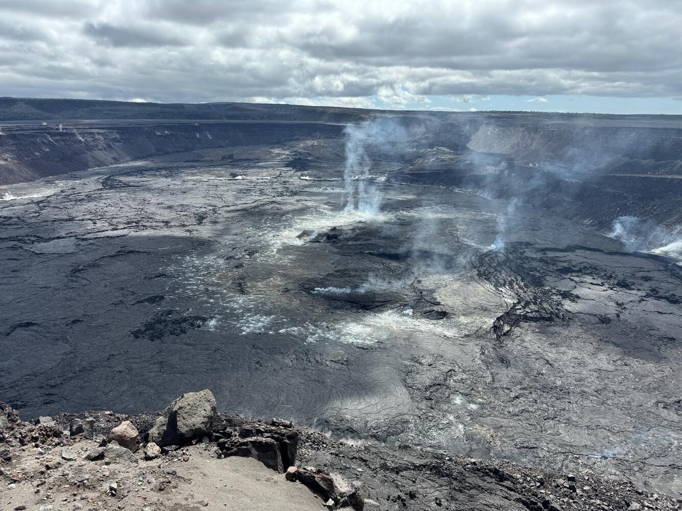 Color photograph of crater at summit of volcano