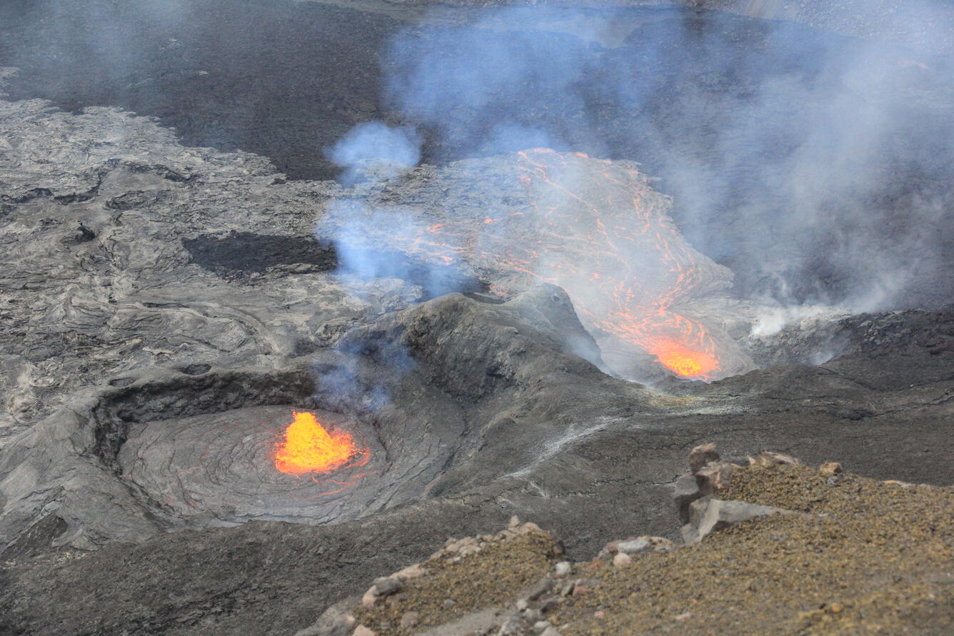 Color photograph of volcanic vents erupting