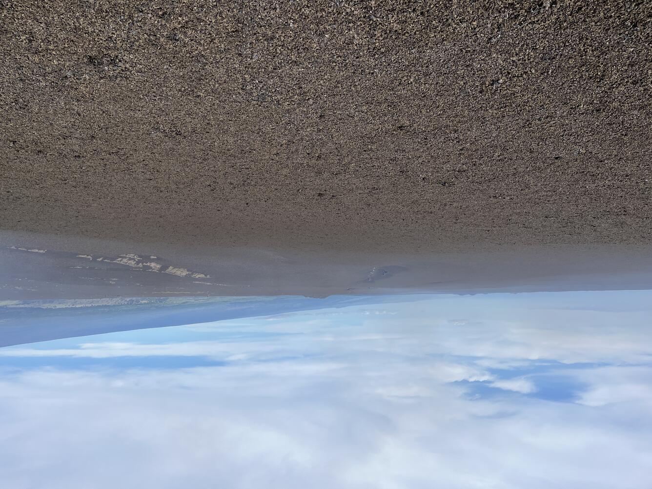 Color photograph of rock covered ground surface