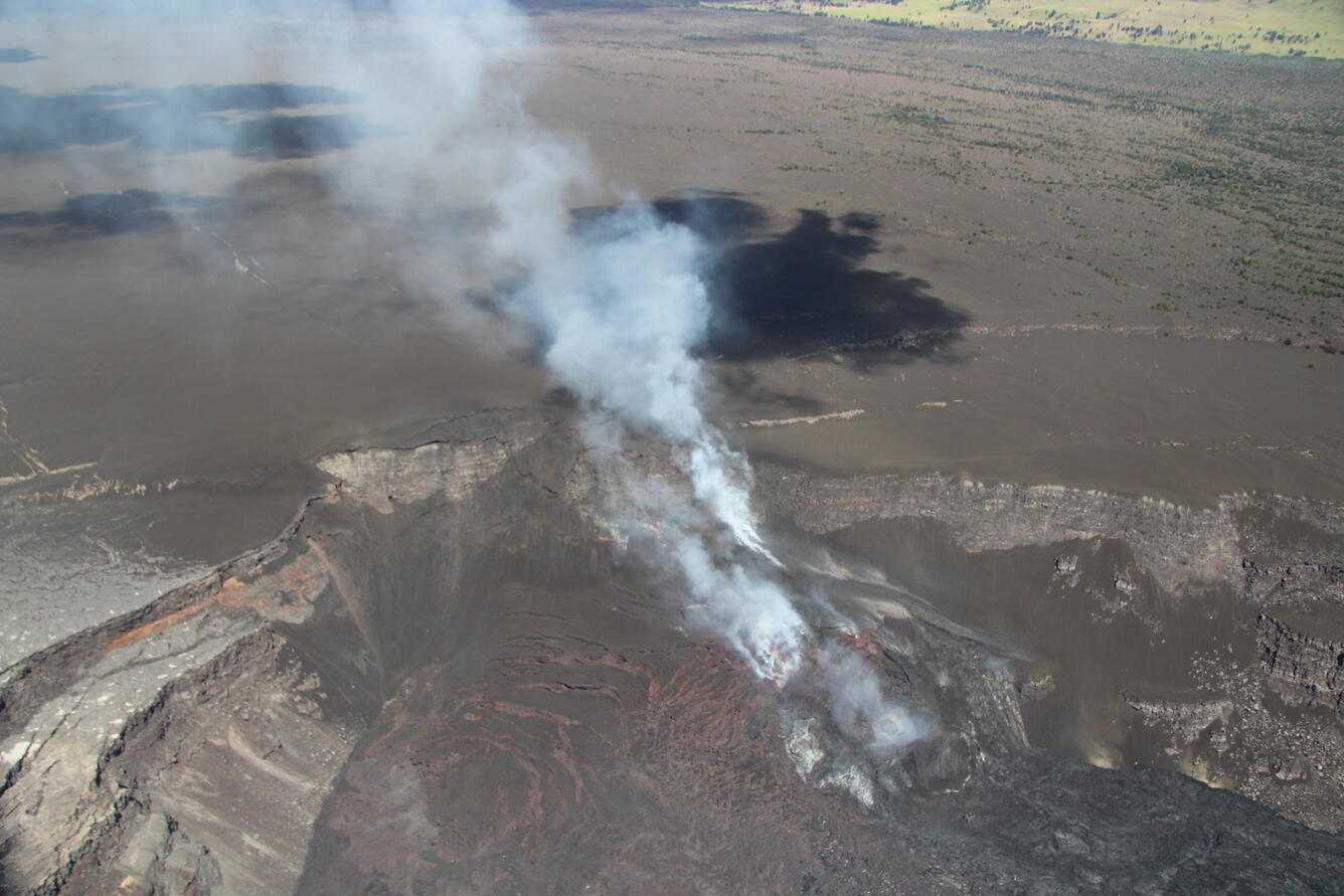 Color photograph of volcanic vent degassing
