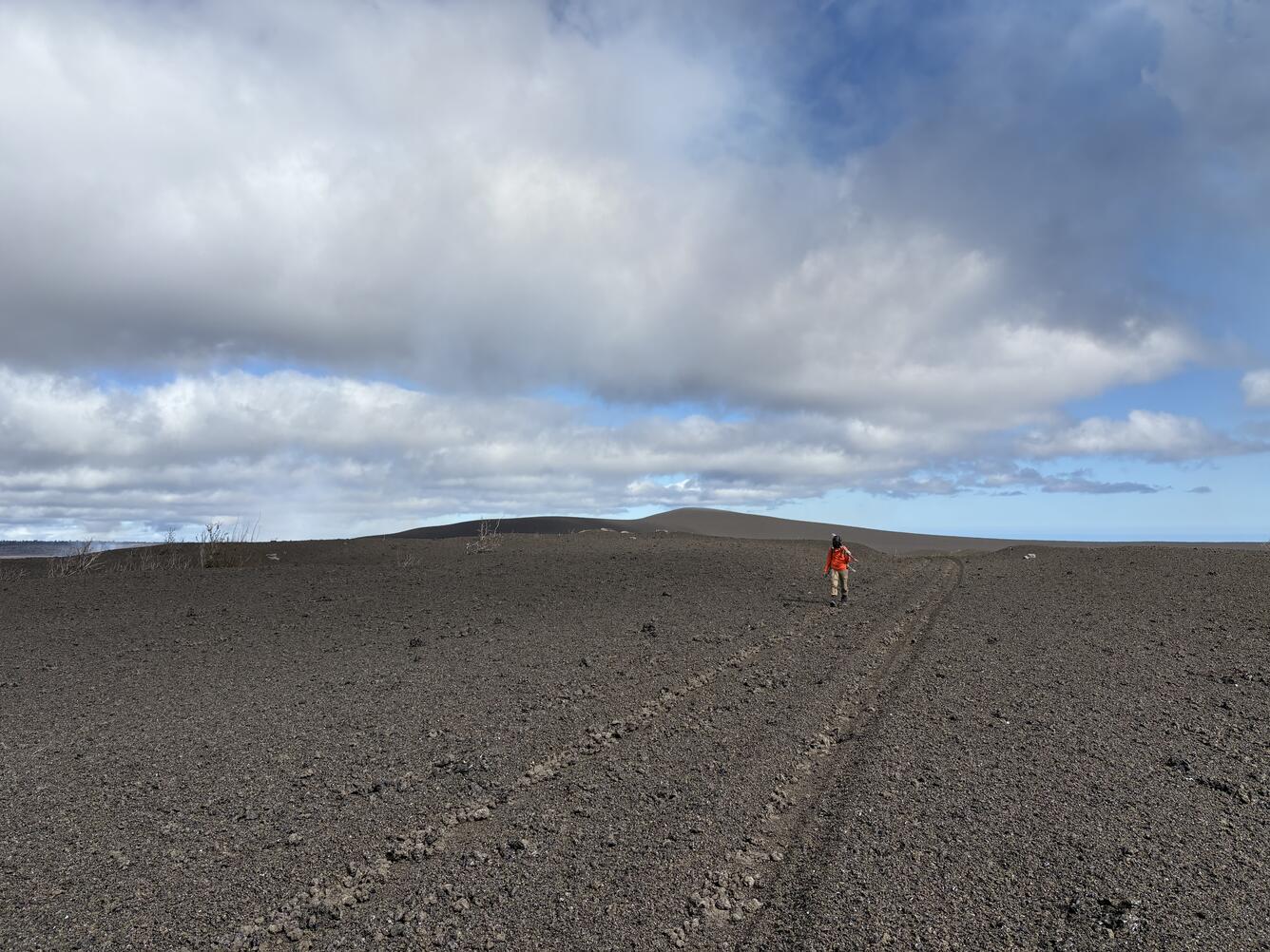 Color photograph of volcanic material deposited on landscape
